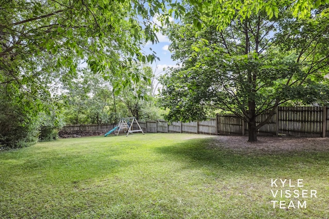 1624 Boston St SE, Grand Rapids, MI 49506 - fenced backyard with a playground