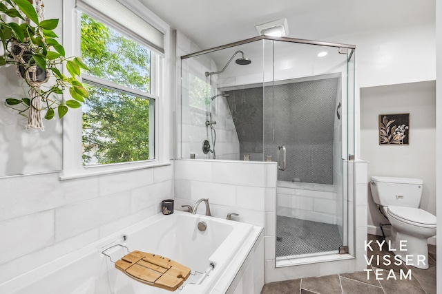 1624 Boston St SE, Grand Rapids, MI 49506 - full bath with a bath, a stall shower, and tile patterned floors