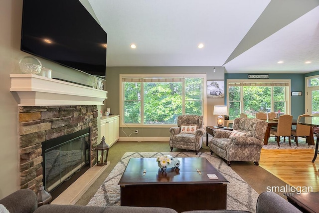 3440 Monterey Hills Dr NE, Grand Rapids, MI 49525 - living room featuring a fireplace and recessed lighting