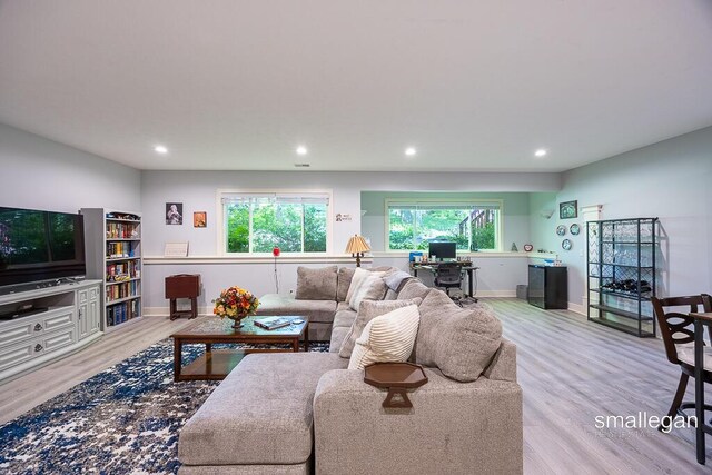3440 Monterey Hills Dr NE, Grand Rapids, MI 49525 - living room featuring plenty of natural light, light wood-style floors, and recessed lighting