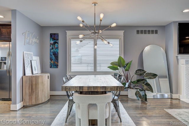 995 Cambridge Rd, Berkley, MI 48072 - dining space with a chandelier, wood finished floors, and recessed lighting