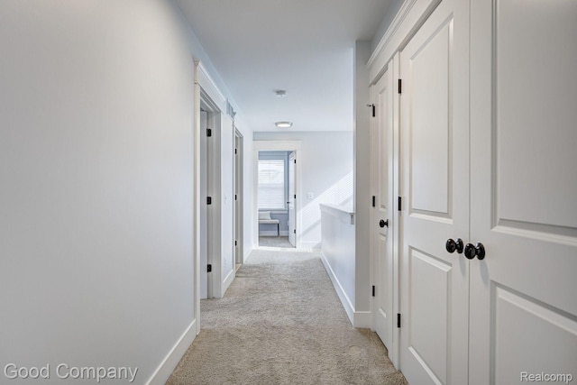 995 Cambridge Rd, Berkley, MI 48072 - hallway featuring light carpet and baseboards