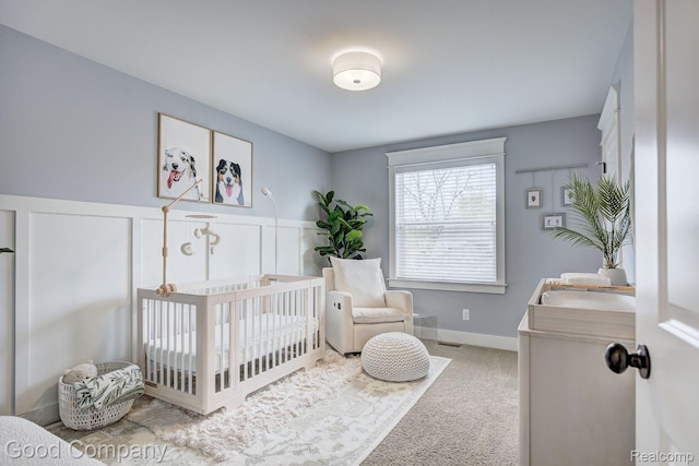995 Cambridge Rd, Berkley, MI 48072 - bedroom with carpet floors and a crib
