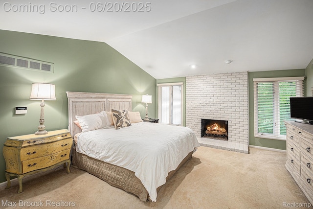 1337 Knollcrest Cir, Bloomfield Hills, MI 48304 - bedroom with vaulted ceiling, carpet flooring, multiple windows, and a brick fireplace