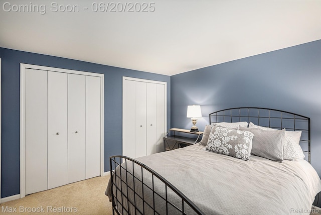 1337 Knollcrest Cir, Bloomfield Hills, MI 48304 - carpeted bedroom featuring two closets and baseboards