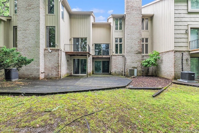 1337 Knollcrest Cir, Bloomfield Hills, MI 48304 - back of house with a balcony, brick siding, a yard, and a deck