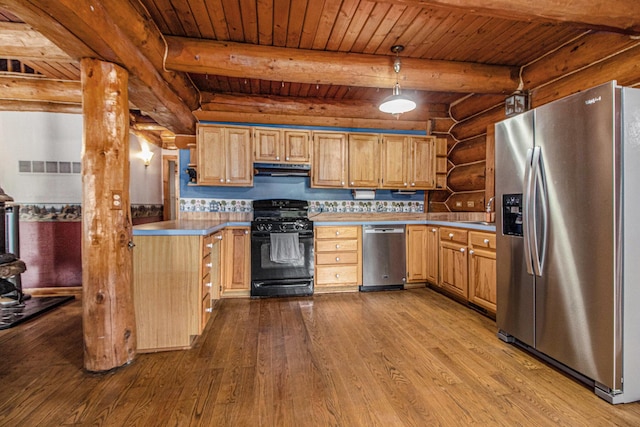 12170 Riethmiller Rd, Grass Lake, MI 49240 - kitchen featuring appliances with stainless steel finishes, log walls, dark wood-style flooring, under cabinet range hood, and a wooden ceiling with exposed beams
