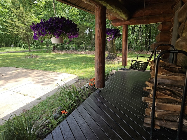 12170 Riethmiller Rd, Grass Lake, MI 49240 - wooden terrace featuring a lawn and a patio area