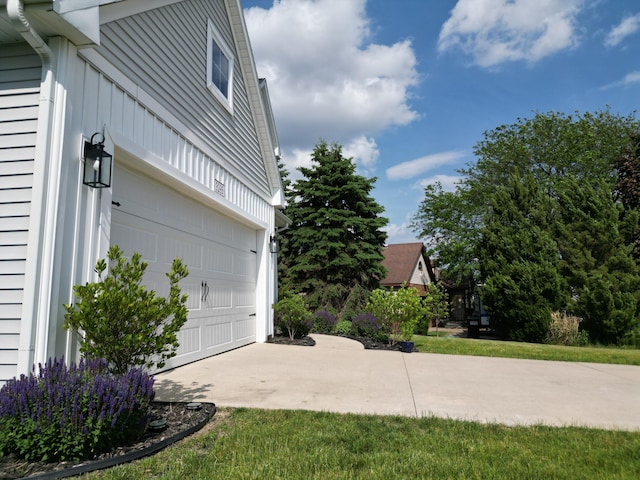 3293 Creek Ridge Dr, Hudsonville, MI 49426 - view of home's exterior featuring concrete driveway and a garage