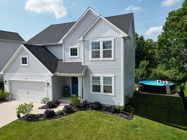 3293 Creek Ridge Dr, Hudsonville, MI 49426 - traditional-style house featuring a shingled roof, concrete driveway, board and batten siding, and a garage