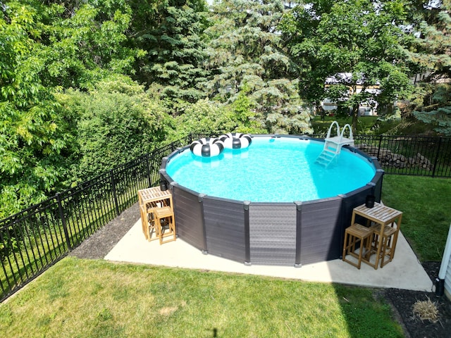 3293 Creek Ridge Dr, Hudsonville, MI 49426 - view of swimming pool with a patio area and a jacuzzi