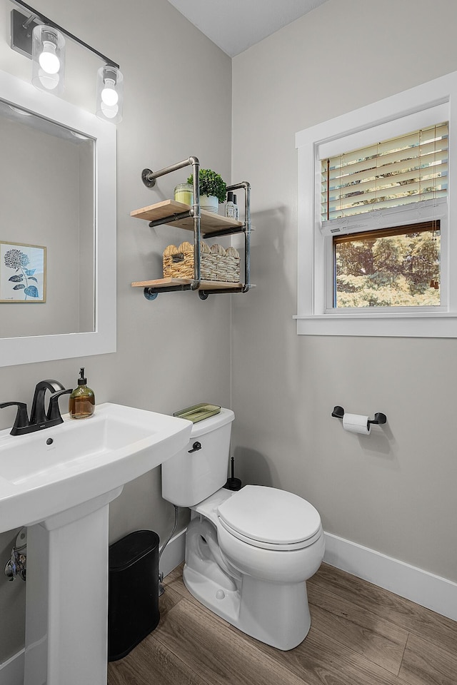 3293 Creek Ridge Dr, Hudsonville, MI 49426 - bathroom with toilet and wood finished floors