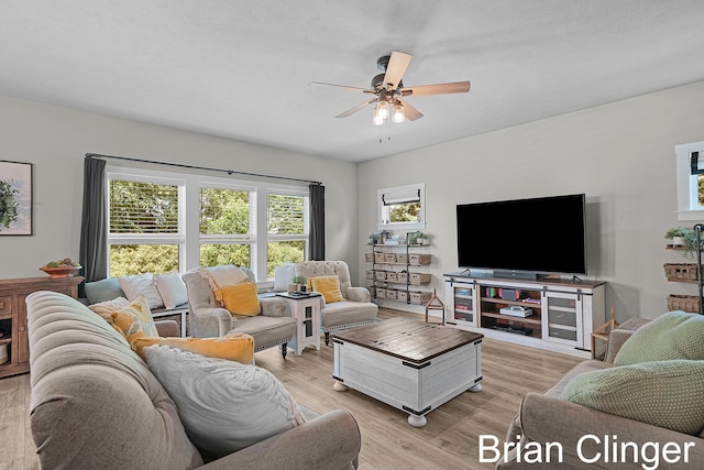 3293 Creek Ridge Dr, Hudsonville, MI 49426 - living room featuring a ceiling fan and light wood finished floors