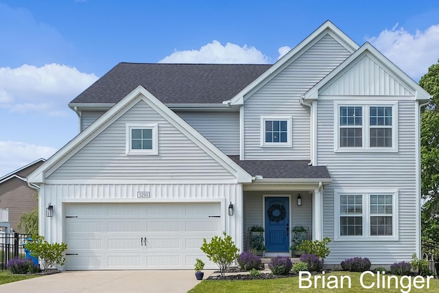 3293 Creek Ridge Dr, Hudsonville, MI 49426 - traditional-style house featuring board and batten siding, driveway, a shingled roof, and a garage