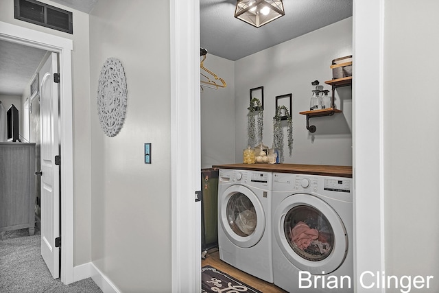 3293 Creek Ridge Dr, Hudsonville, MI 49426 - laundry room featuring washing machine and dryer and baseboards