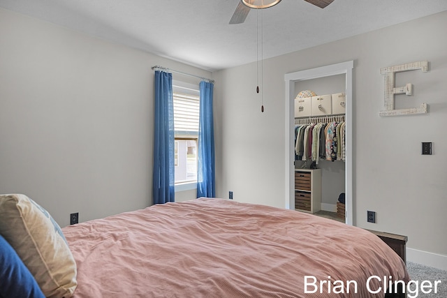 3293 Creek Ridge Dr, Hudsonville, MI 49426 - carpeted bedroom with a spacious closet, a closet, and a ceiling fan