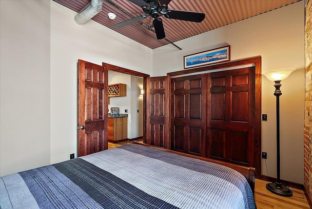 333 State St Unit 5, Saint Joseph, MI 49085 - bedroom featuring light wood-style floors and baseboards