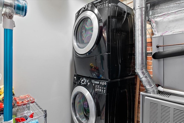 333 State St Unit 5, Saint Joseph, MI 49085 - laundry area featuring estacked washer and dryer