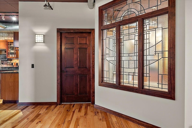 333 State St Unit 5, Saint Joseph, MI 49085 - entrance foyer featuring baseboards and light wood-style flooring