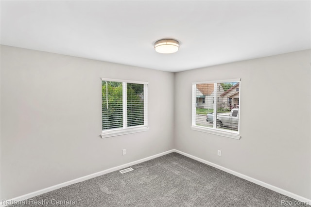 7220 Dodge Ave, Warren, MI 48091 - empty room featuring healthy amount of natural light and carpet floors