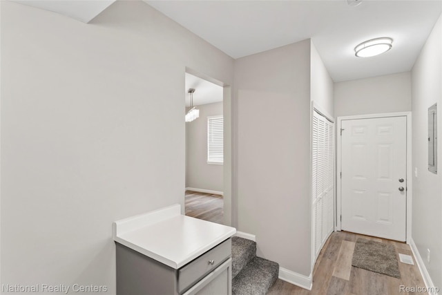 7220 Dodge Ave, Warren, MI 48091 - foyer with light wood-style floors and baseboards