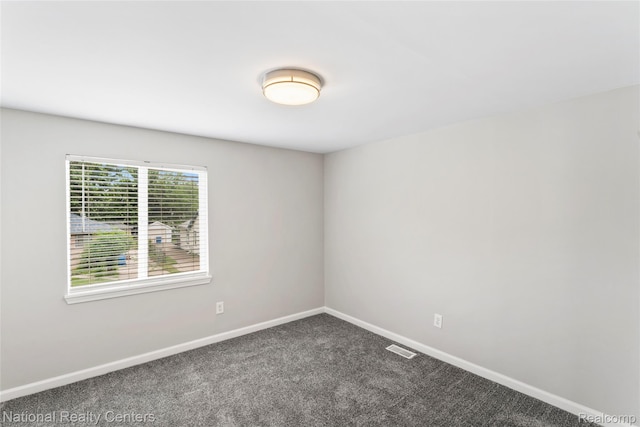 7220 Dodge Ave, Warren, MI 48091 - spare room featuring carpet flooring and baseboards