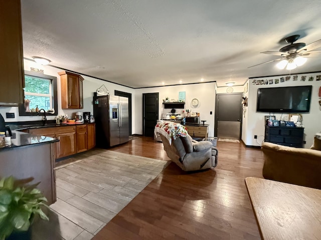 13820 Morenci Rd, Morenci, MI 49256 - living area with dark wood-type flooring, a textured ceiling, and ceiling fan