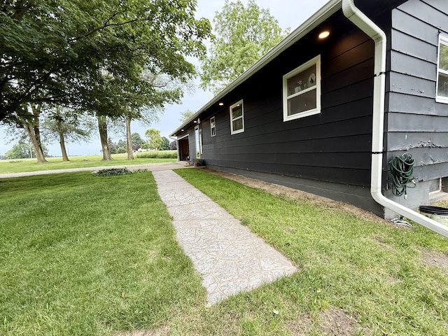 13820 Morenci Rd, Morenci, MI 49256 - view of home's exterior with a lawn