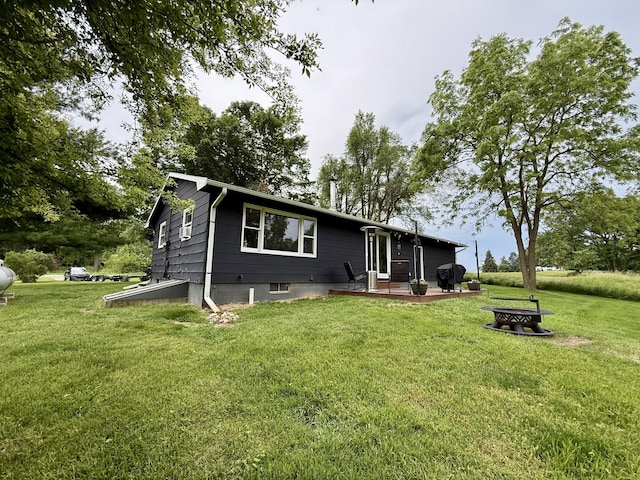 13820 Morenci Rd, Morenci, MI 49256 - back of property featuring a yard and a deck