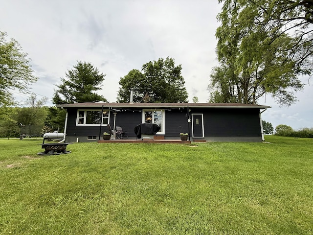13820 Morenci Rd, Morenci, MI 49256 - rear view of house featuring a yard