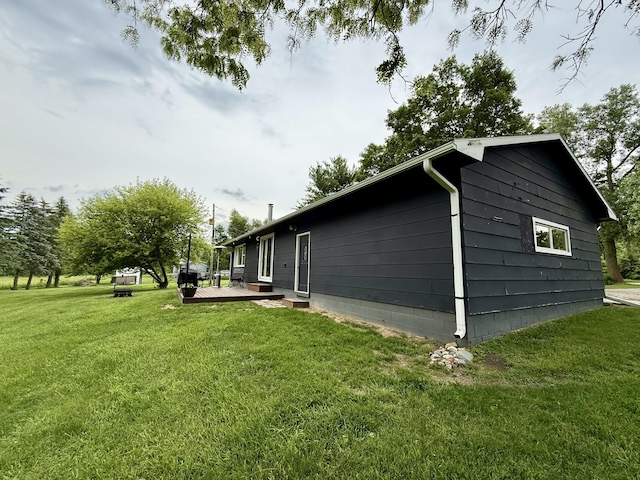 13820 Morenci Rd, Morenci, MI 49256 - view of side of home with a yard and a wooden deck