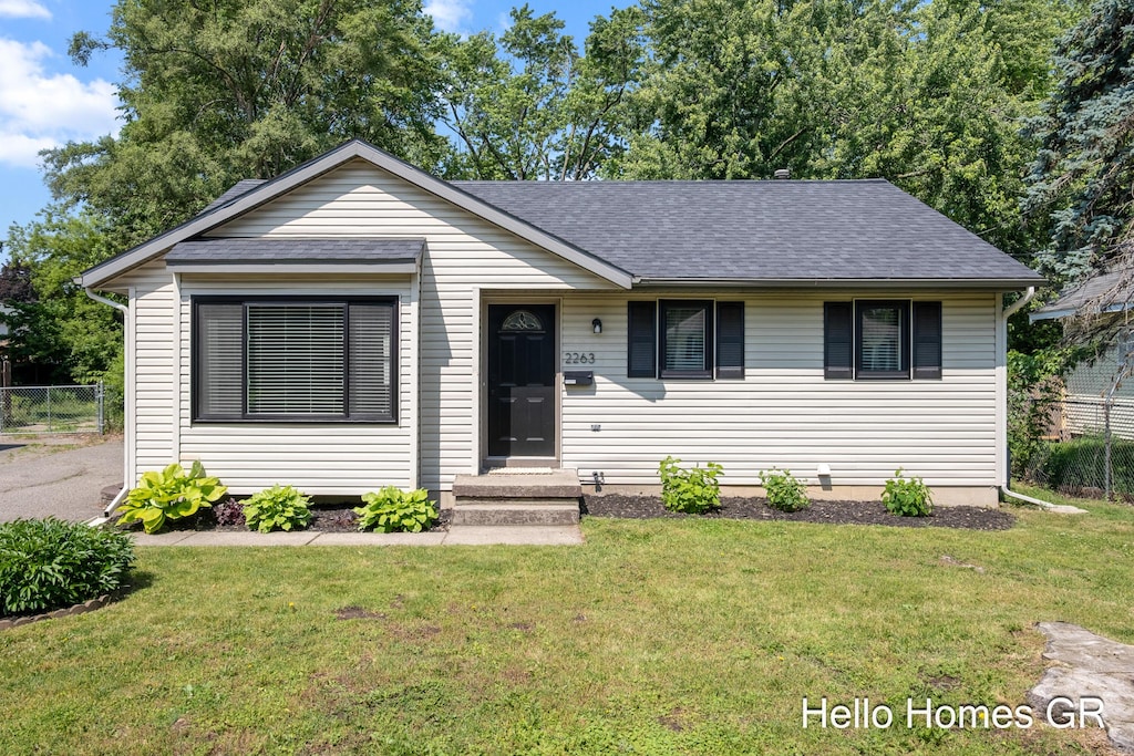 2263 Wyoming Ave SW, Wyoming, MI 49519 - single story home featuring roof with shingles