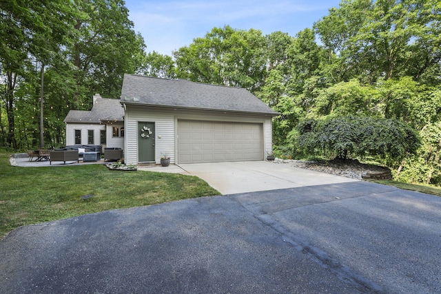 1255 White Pine Dr SW, Grand Rapids, MI 49534 - garage featuring driveway