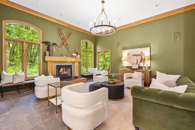 1255 White Pine Dr SW, Grand Rapids, MI 49534 - living area featuring a chandelier, carpet, a fireplace, crown molding, and recessed lighting
