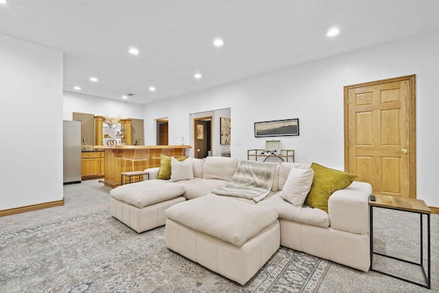 1255 White Pine Dr SW, Grand Rapids, MI 49534 - living room with light colored carpet and recessed lighting