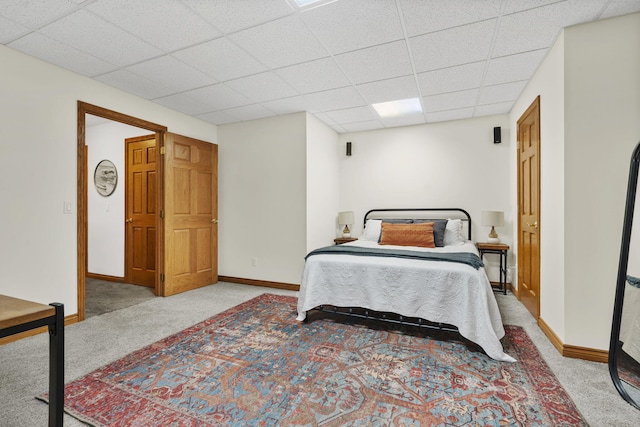 1255 White Pine Dr SW, Grand Rapids, MI 49534 - carpeted bedroom featuring a paneled ceiling and baseboards