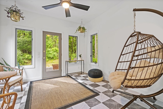 1255 White Pine Dr SW, Grand Rapids, MI 49534 - sitting room with healthy amount of natural light and a ceiling fan