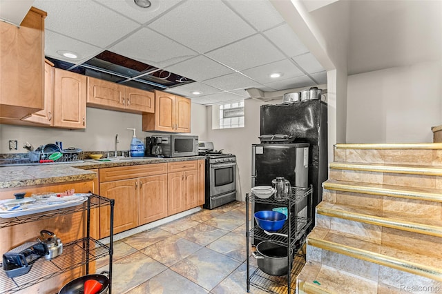 6842 Jonathon St, Dearborn, MI 48126 - kitchen with stainless steel appliances, a paneled ceiling, recessed lighting, and light brown cabinets