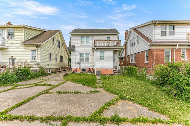 6842 Jonathon St, Dearborn, MI 48126 - rear view of property featuring a balcony