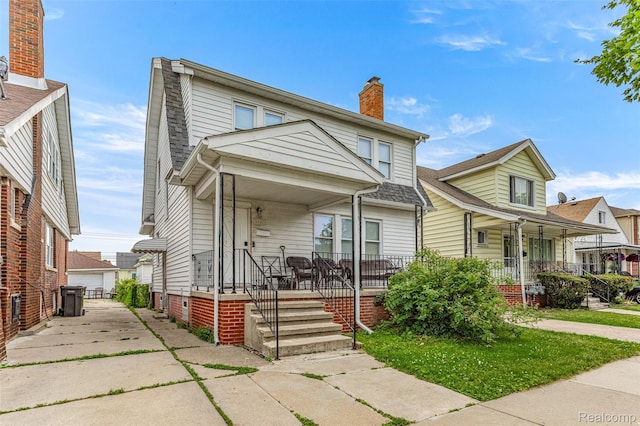 6842 Jonathon St, Dearborn, MI 48126 - view of front facade featuring a porch, a chimney, roof with shingles, and a detached garage