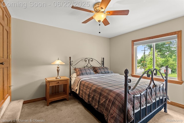 5443 Ridgemont St, Howell, MI 48843 - bedroom with light colored carpet and a ceiling fan