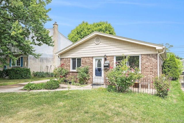 27336 Alger Blvd, Bloomfield Hills, MI 48071 - view of front of house featuring a front yard, brick siding, and a chimney