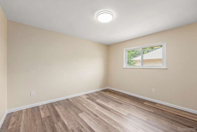 27336 Alger Blvd, Bloomfield Hills, MI 48071 - spare room with light wood-style floors and baseboards