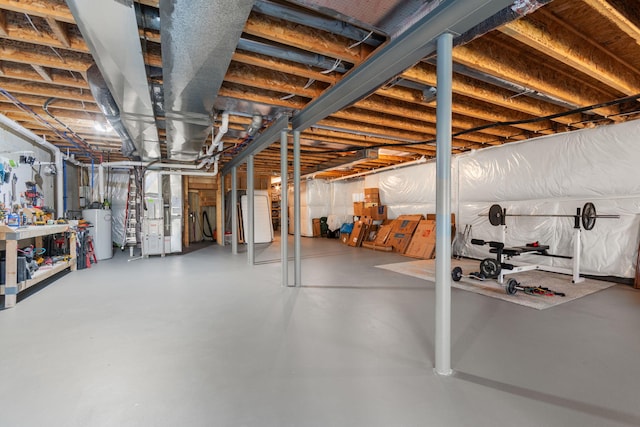 3078 N Spurway Dr, Ann Arbor, MI 48105 - unfinished basement with water heater and heating unit