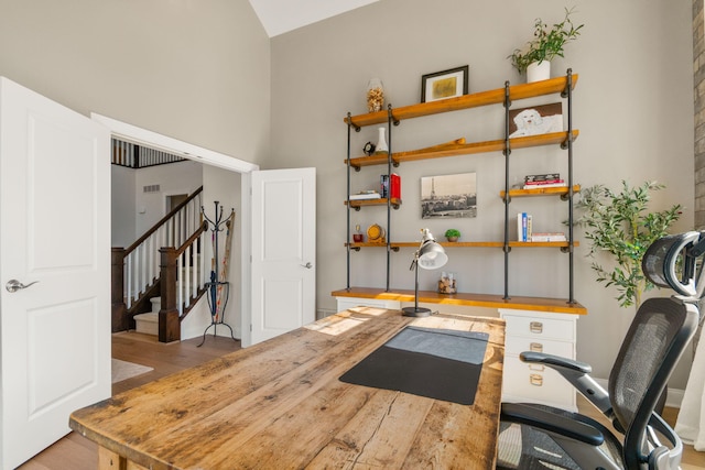 3078 N Spurway Dr, Ann Arbor, MI 48105 - office area with wood finished floors and high vaulted ceiling