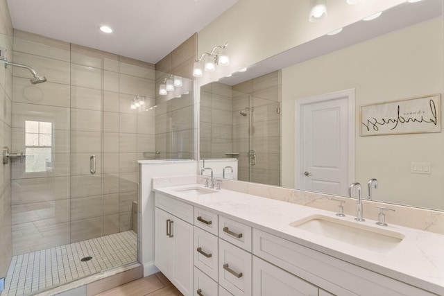 3078 N Spurway Dr, Ann Arbor, MI 48105 - bathroom featuring a stall shower, double vanity, and recessed lighting