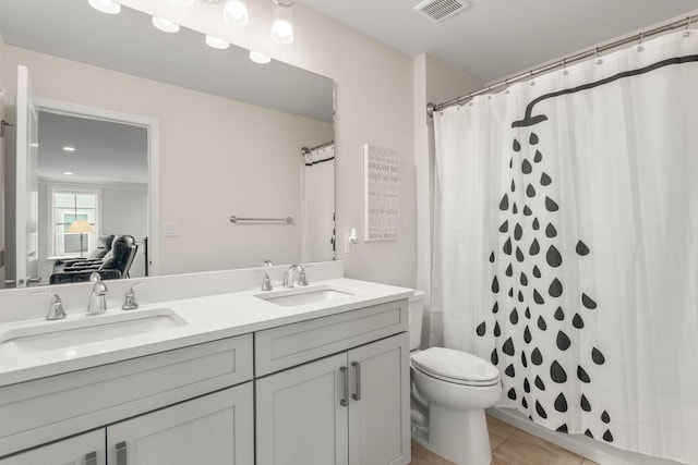 3078 N Spurway Dr, Ann Arbor, MI 48105 - full bathroom with double vanity, tile patterned flooring, and a shower with curtain