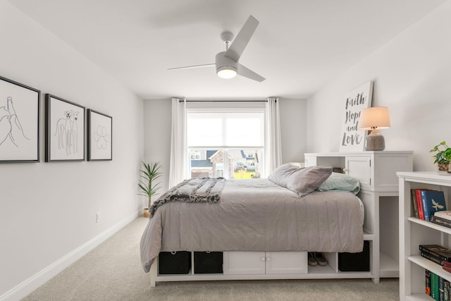 3078 N Spurway Dr, Ann Arbor, MI 48105 - carpeted bedroom with baseboards and a ceiling fan