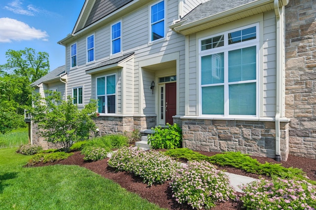 3078 N Spurway Dr, Ann Arbor, MI 48105 - entrance to property featuring stone siding and roof with shingles
