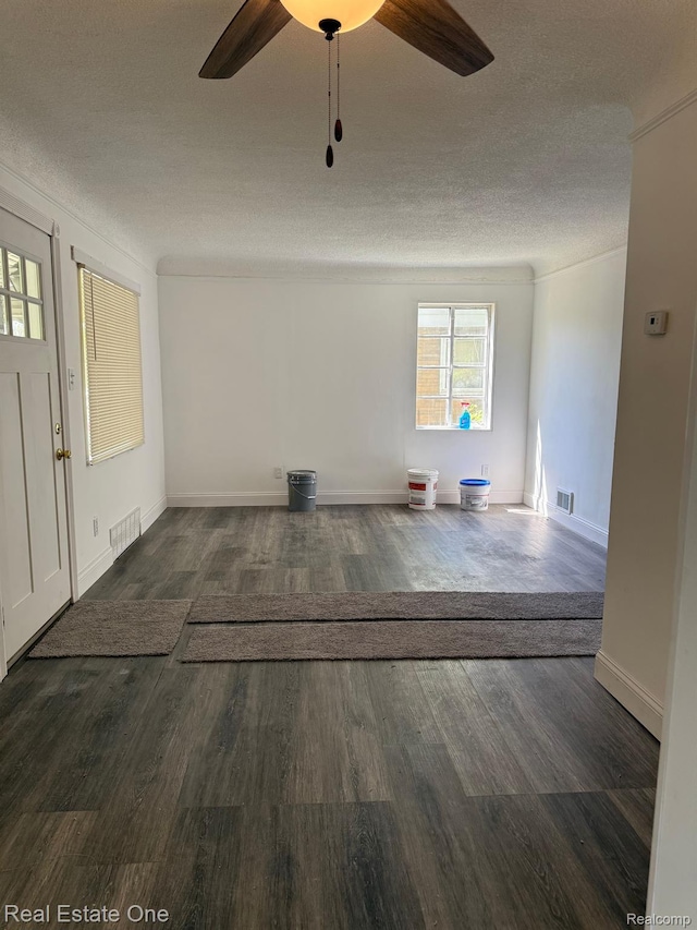 6365 Longacre St, Detroit, MI 48228 - unfurnished living room with ceiling fan, a textured ceiling, and wood finished floors